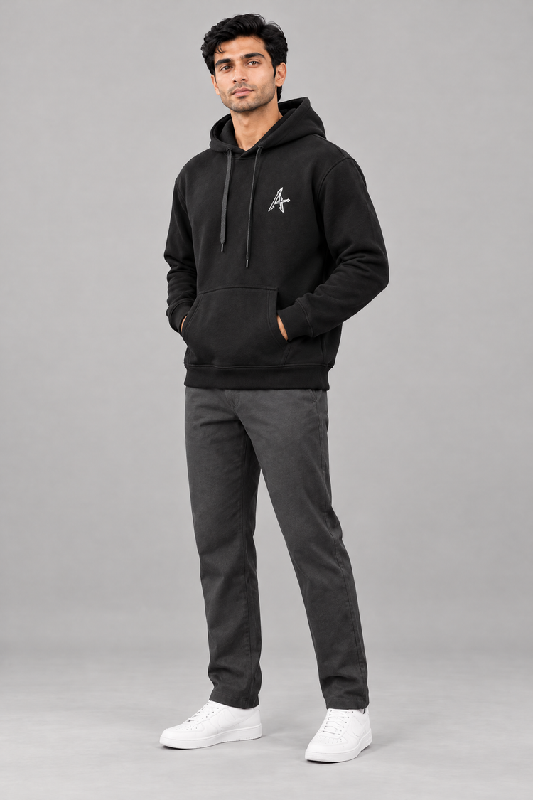 ADOT heavyweight pullover hoodie in Jet Black, worn, three-quarter